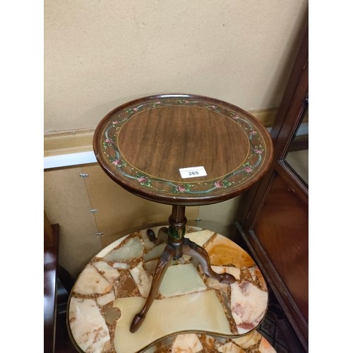 265 - 1900s wine table with hand painted design .