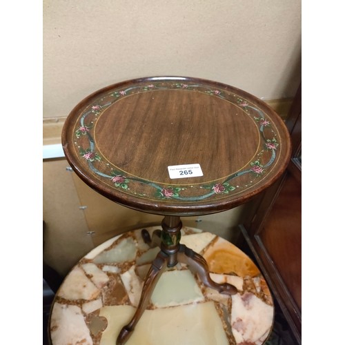 265 - 1900s wine table with hand painted design .