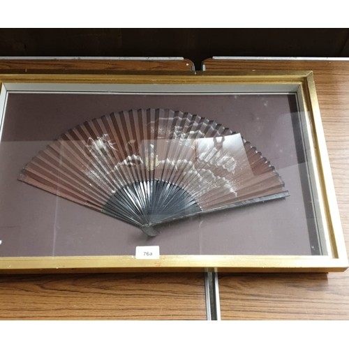 76a - Framed oriental fan .