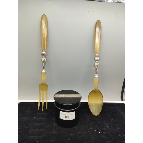 83 - Pair of Scottish horn fork and porridge spoon with white metal binding together with white metal top... 