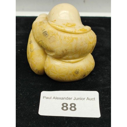 88 - Chinese Buddha with children netsuke signed to base.