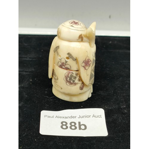 88b - Chinese traveller netsuke signed to base.