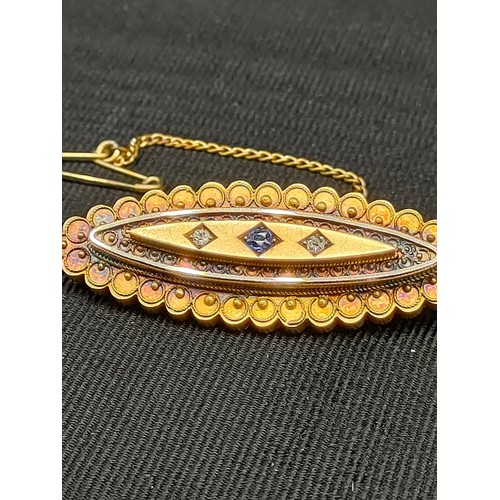 1 - 15ct gold victorian morning brooch set with sapphire and diamonds . 7 grams .