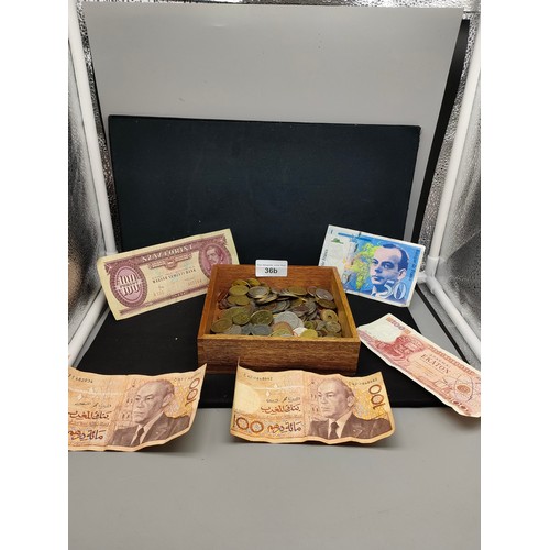 36b - Box of various coins together with notes .