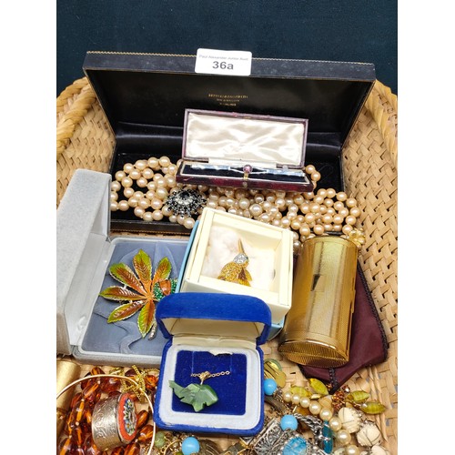 36a - Box of quality costume jewellery .