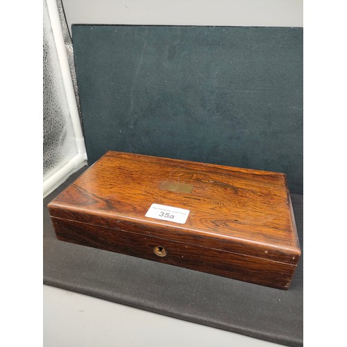 35a - 1900s storage box with contents .