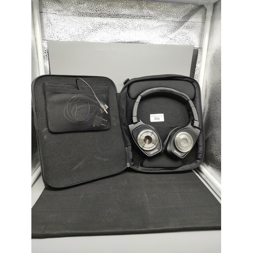 50b - Denon head sets in fitted case.