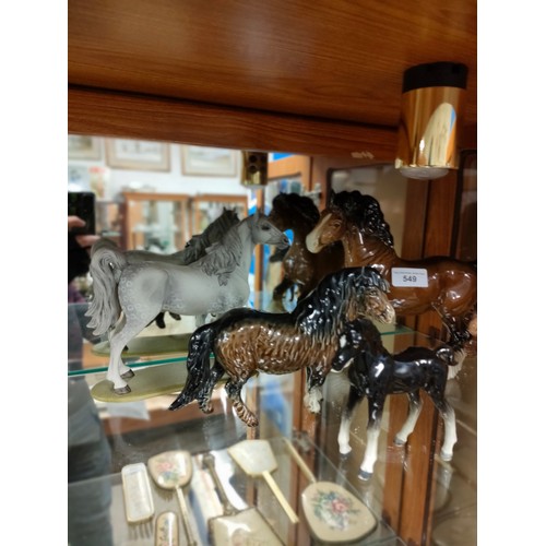 549 - Collection of beswick horses etc . Af .