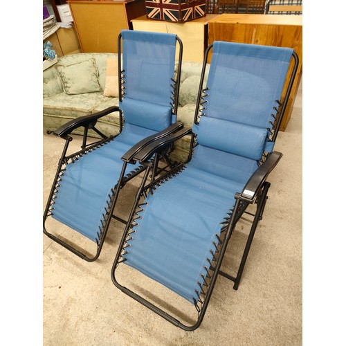 537 - Pair of garden sun lounger chairs .