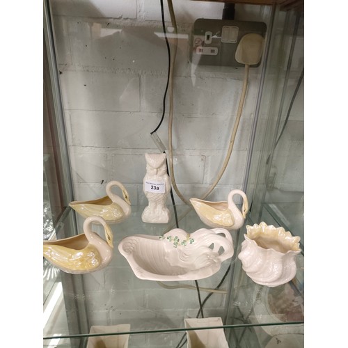 23a - Shelf of Irish Belleek porcelain includes owl etc .