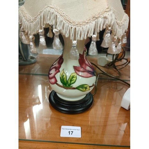 17 - Moorcroft cream back ground table lamp with orchid design .