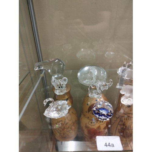 44a - Shelf of crystal animals includes Swarovski etc .