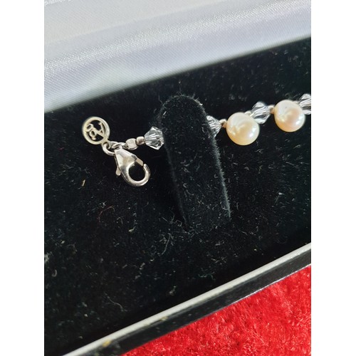 58 - Beautiful Silver Pearl And Light Blue Stones Bracelet