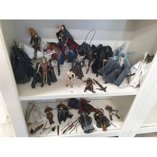 206 - Large Collection Of Lord Of The Rings Figures Gandalf Legolass Gimley Boramere Gollum ect And Weapon... 