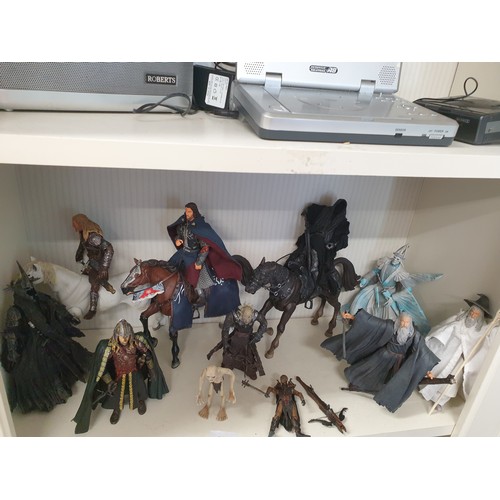 206 - Large Collection Of Lord Of The Rings Figures Gandalf Legolass Gimley Boramere Gollum ect And Weapon... 