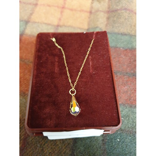 11 - 9ct Gold Chain With Gold And Crystal Tear Drop Pendant