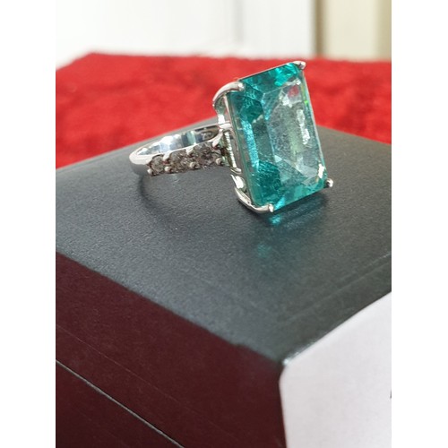 25 - Silver And Blue Stone Ring With Clear Stones To Shoulders