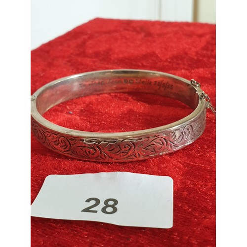 28 - Silver Hallmarked Bangle With Diamond Cut Design To Front