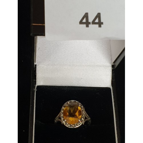 44 - Lovely Silver Amber Coloured Large Stone Ring Surrounded With Marcasite