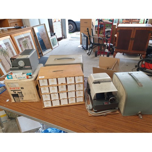 361 - Selection Of Slide Projectors Aldis And Braun With Slide Storage Cabinet And 2 New Projector Lamp Bu... 