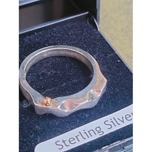 31 - Silver mother of pearl set ring together with other silver ring .