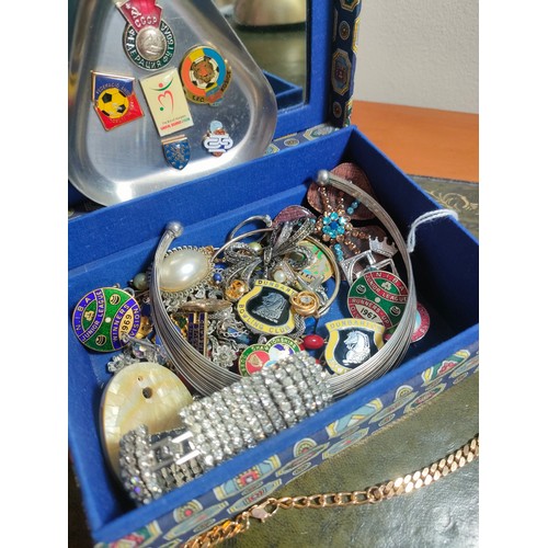 33 - Box of costume jewellery includes bowling badges etc .