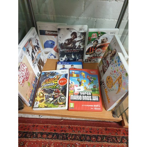 188 - Shelf Of Nintendo Wii Games Including  Super Mario Brothjers And A PS4 Game