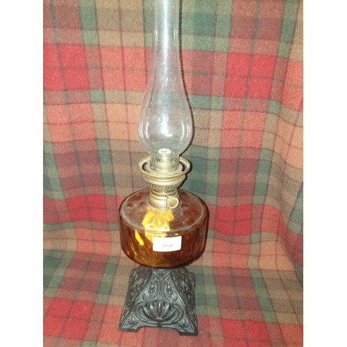 160 - Victorian Oil Lamp With Amber Glass Reservoir And Glass Funnel Stands 49cms Tall