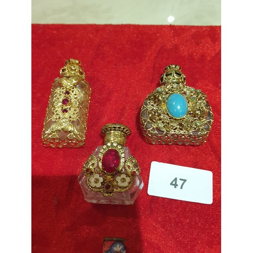 47 - 3 Assorted Perfume Bottles