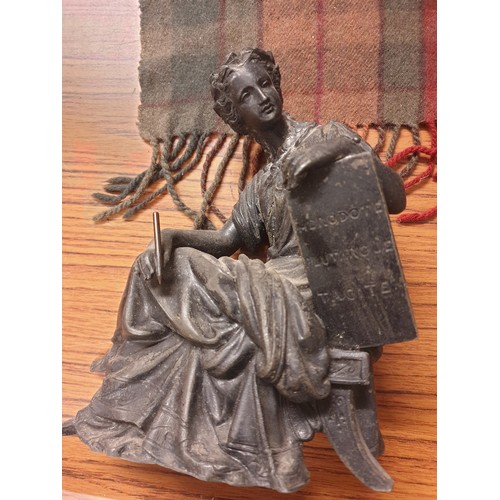 204 - Victorian Spelter Figure Of Recumbant Lady  with tablet Herodote plutarque tagite