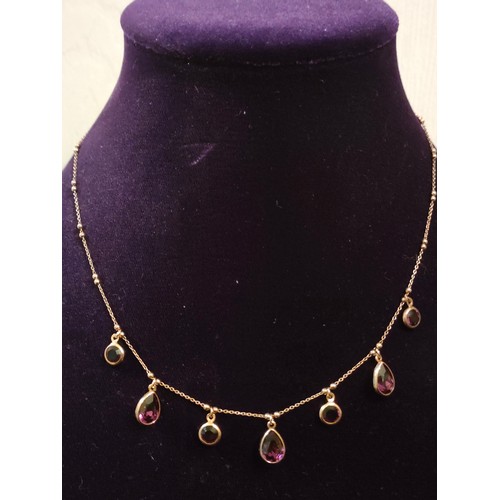 59 - Beautiful 925 Silver / gold necklace set with purple stones.