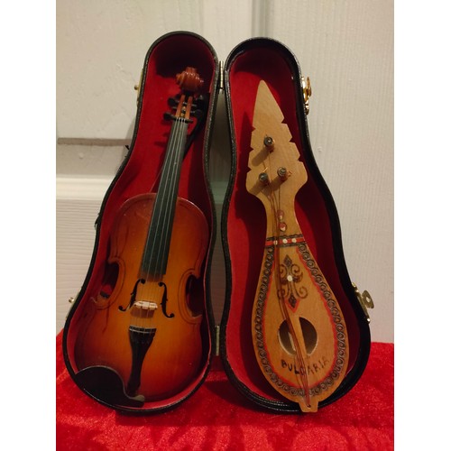 55 - 2 Novelty musical instruments ornament s with case.