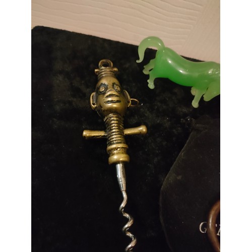 56 - 2 unusual collectable cork screws , jade horse figure together vintage lip stick holder.