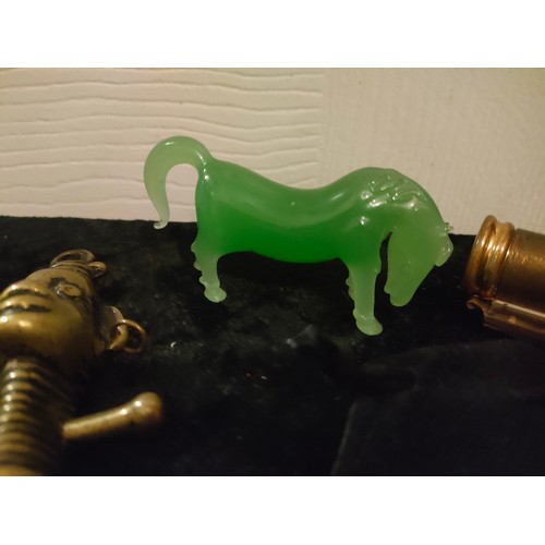 56 - 2 unusual collectable cork screws , jade horse figure together vintage lip stick holder.