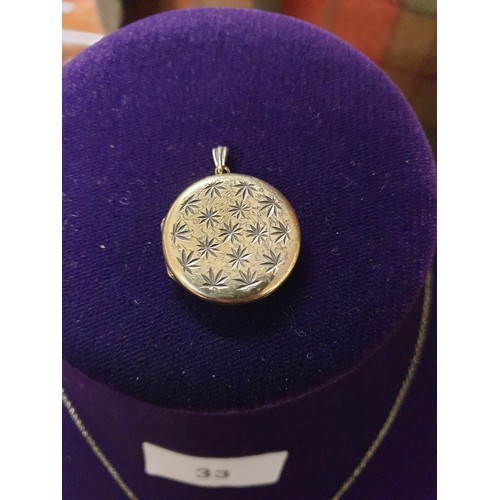 33 - Silver Chain And Pendant And Silver Locket