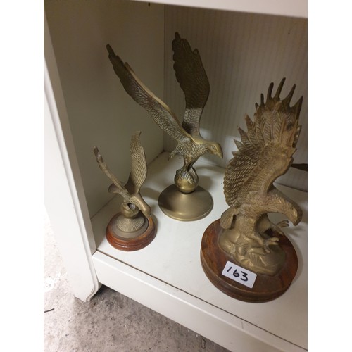 163 - Shelf Of Brass Eagles ect