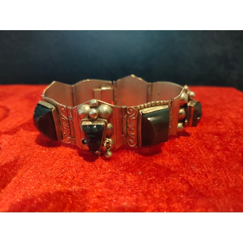 51 - Heavy white metal bracelet set with stones.