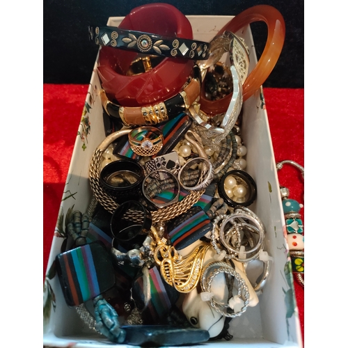 51A - Box of costume jewellery includes amber style bangles , rings , bracelets to include charm bracelet ... 