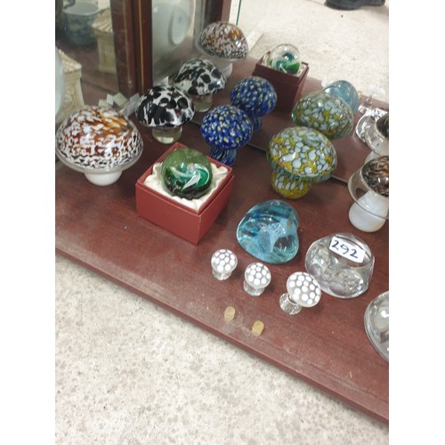 292 - Shelf Of Paperweights Toadstools ect