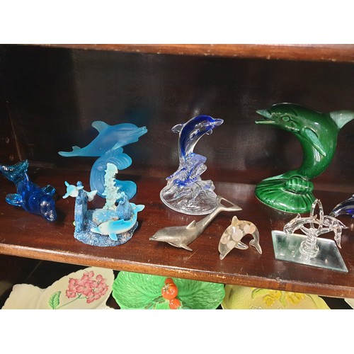 343 - Shelf Of Dolphin Items