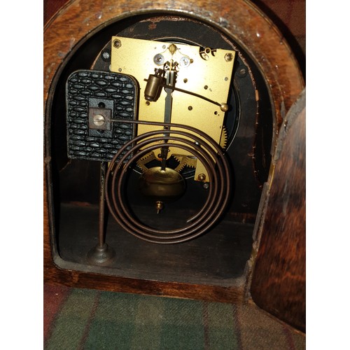 82 - Beautiful Oak Cased Mantel Clock With Carved Design To Front With Pendulum Ticks And Chimes