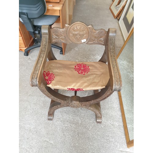 325 - x Frame Rustic Arm Chair With Carved Back