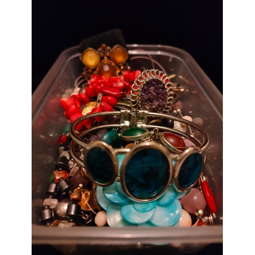 16 - A box of jewellery includes ornate bangles etc