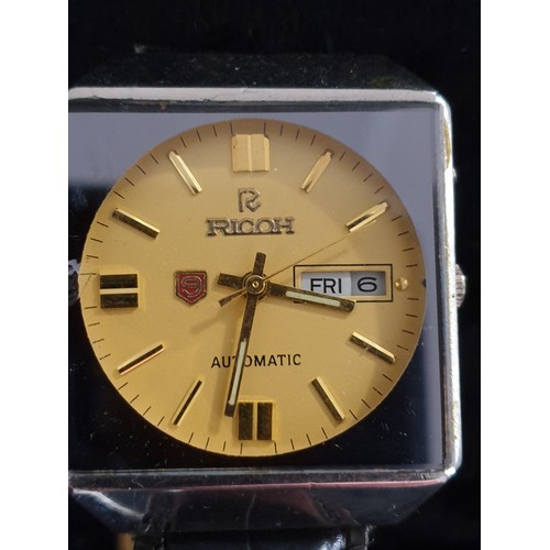 32B - Unusual Ricoh Automatic Wrist Watch With Day And Date Calendar Working