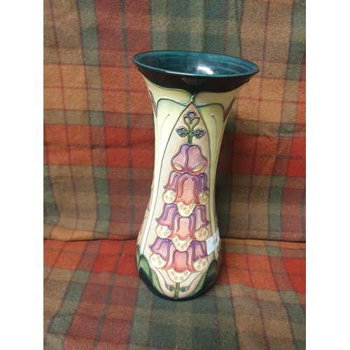 119 - A Large Impressive Foxglove Pattern Vase With Green Ground Stands (31cm in height)