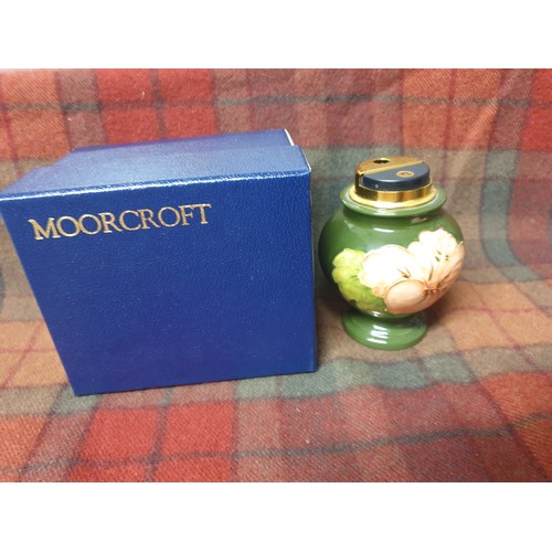 124 - A Rare Early Moorcroft Hibiscus Pattern Lighter With Green Ground Stands (11cm in height) With Origi... 