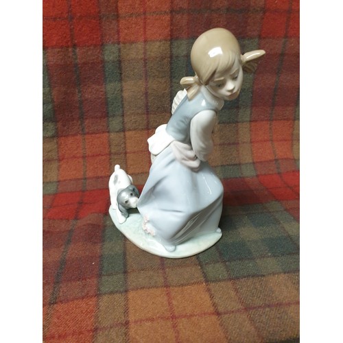 138 - A Lladro figurine  'Girl With Puppy' Figure