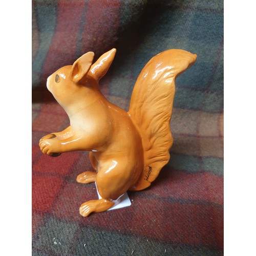 185 - A Rare Beswick Red Squirrel Stands (11cm in height)