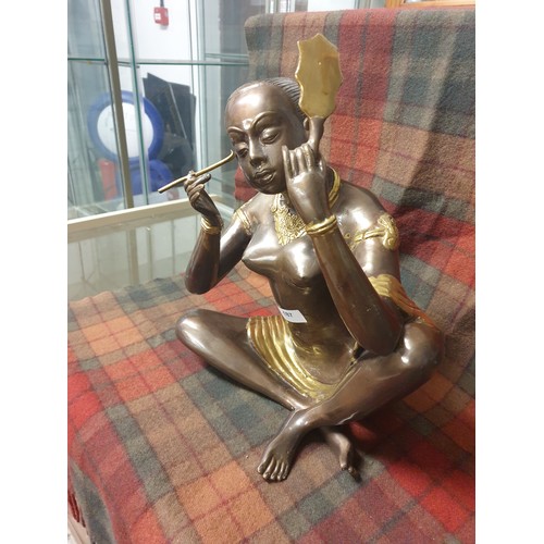 187 - A Large Oriental Bronze Semi Nude Figure Lady Putting Make Up On (Stands 38cm in height & Weights 6.... 