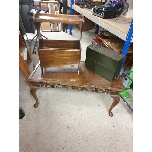 321 - A Coffee Table With Glass Preserve Magazine Rack And Document Box With Contents